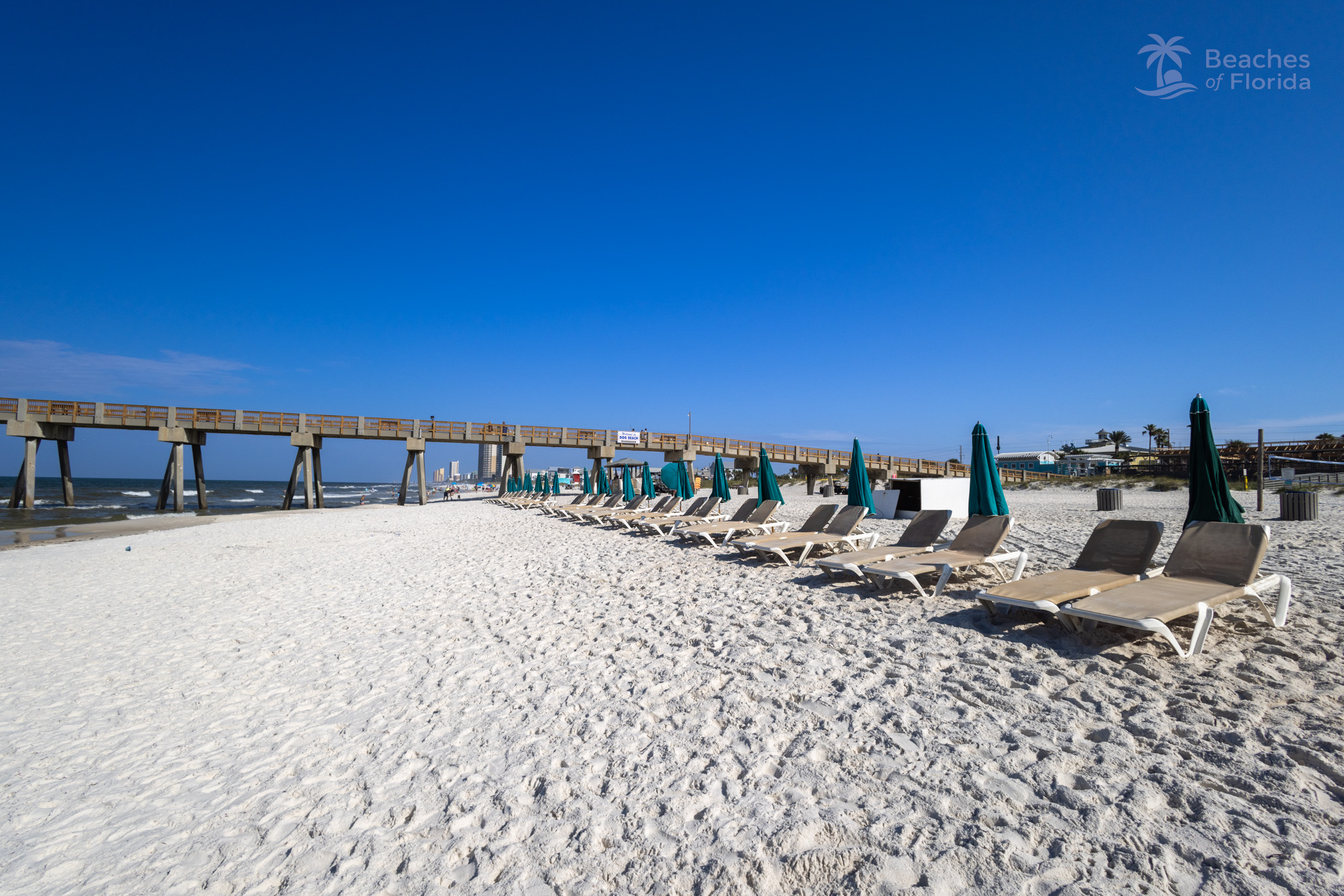 Chair rentals and umbrellas near the pier at Panama City Beach