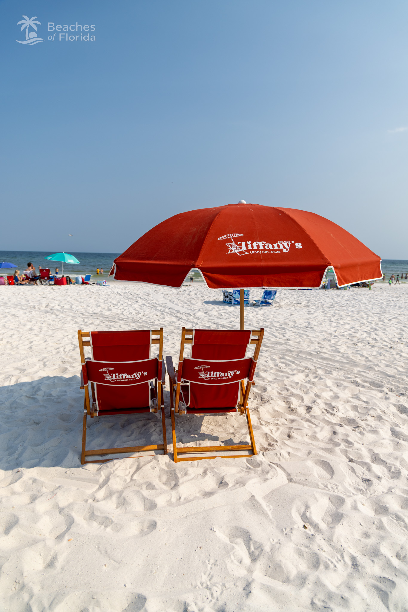 One of multiple beach chair rentals available at Pensacola Beach